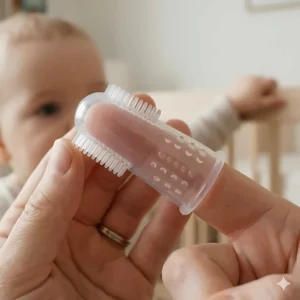 Detailed view of the soft bristles and massaging bumps on a silicone finger toothbrush for babies designed for cleaning and gum massage.